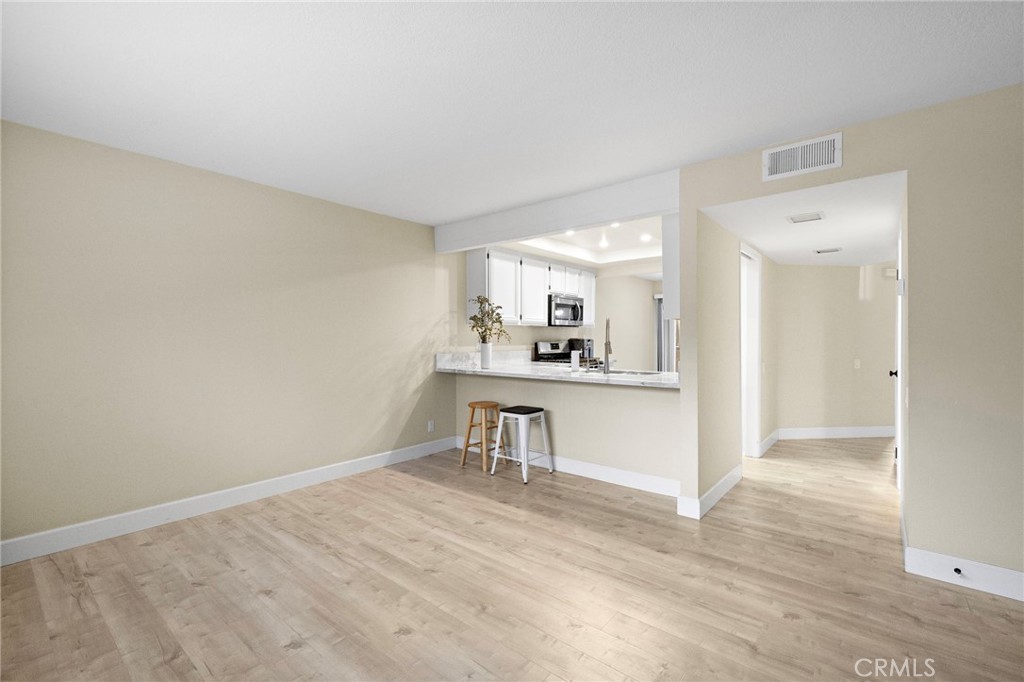 6 Fieldflower Irvine, CA 92614 - Photo 17 of 37 a view of kitchen with sink refrigerator and cabinets