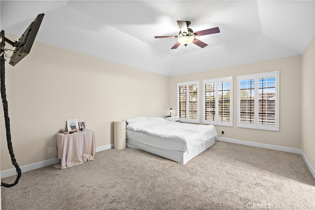 6 Fieldflower Irvine, CA 92614 - Photo 20 of 37 a spacious bedroom with a bed and a large window