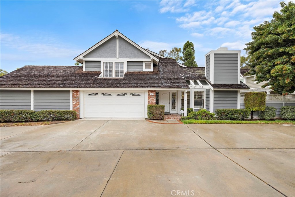 6 Fieldflower Irvine, CA 92614 - Photo 2 of 37 a front view of a house with a yard and garage