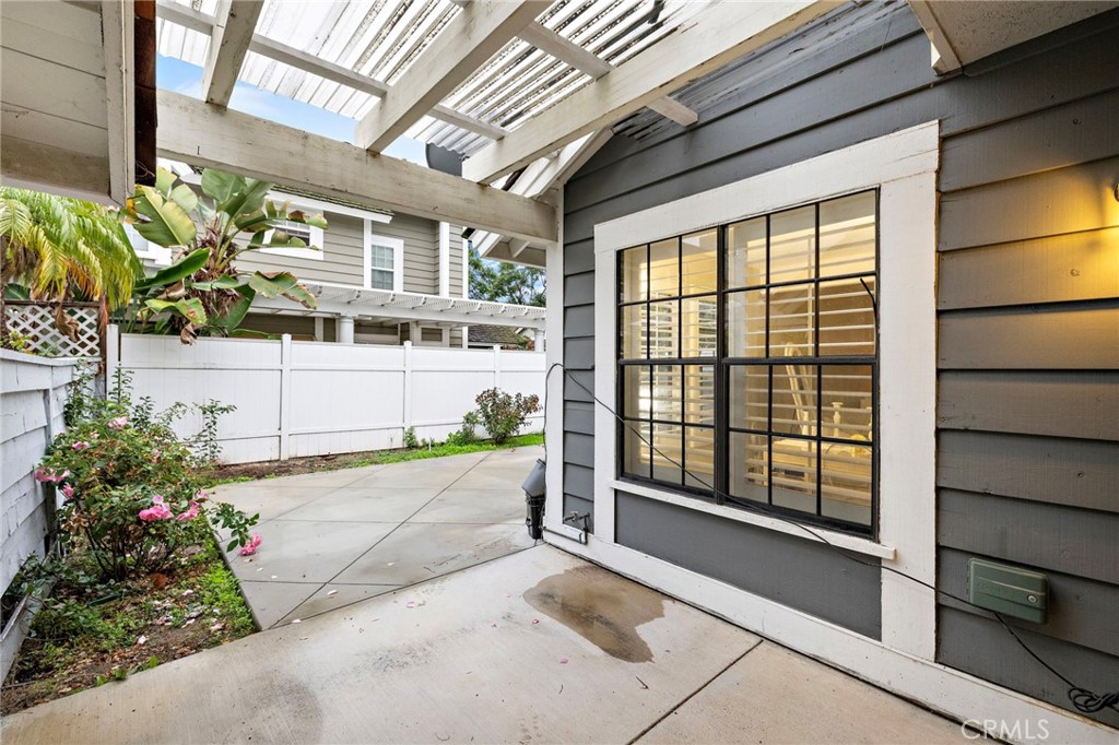 6 Fieldflower Irvine, CA 92614 - Photo 29 of 37 a front view of a house with a yard and flowers