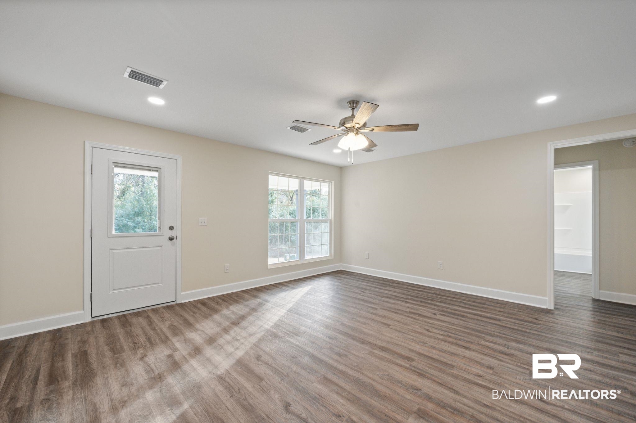 1473 Pollard Road Daphne, AL 36526 - Photo 8 of 32 Interior space with dark wood-type flooring and ceiling fan