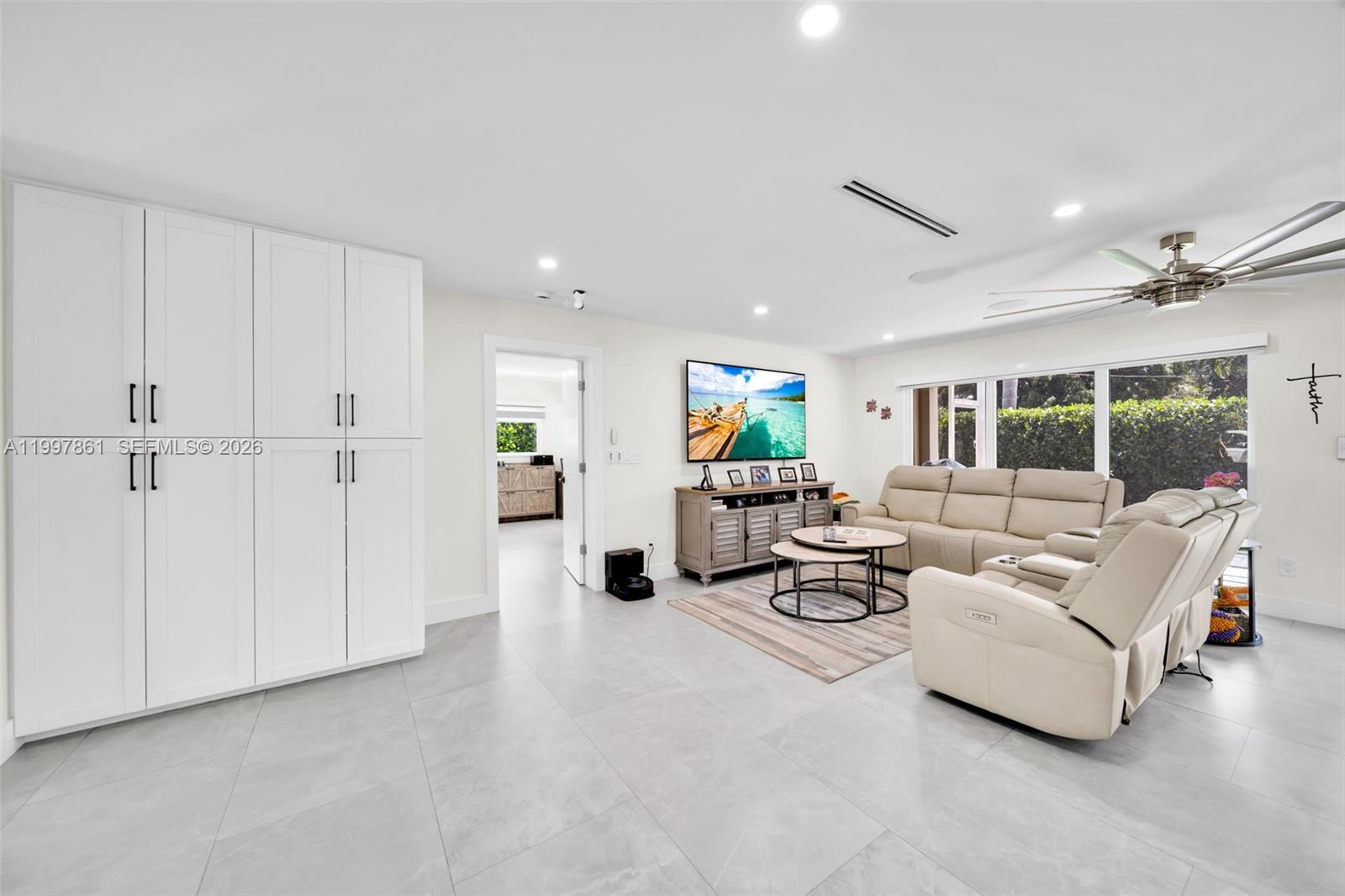 1574 Ricardo Avenue Fort Myers, FL 33901 - Photo 25 of 59 a living room with furniture and white walls