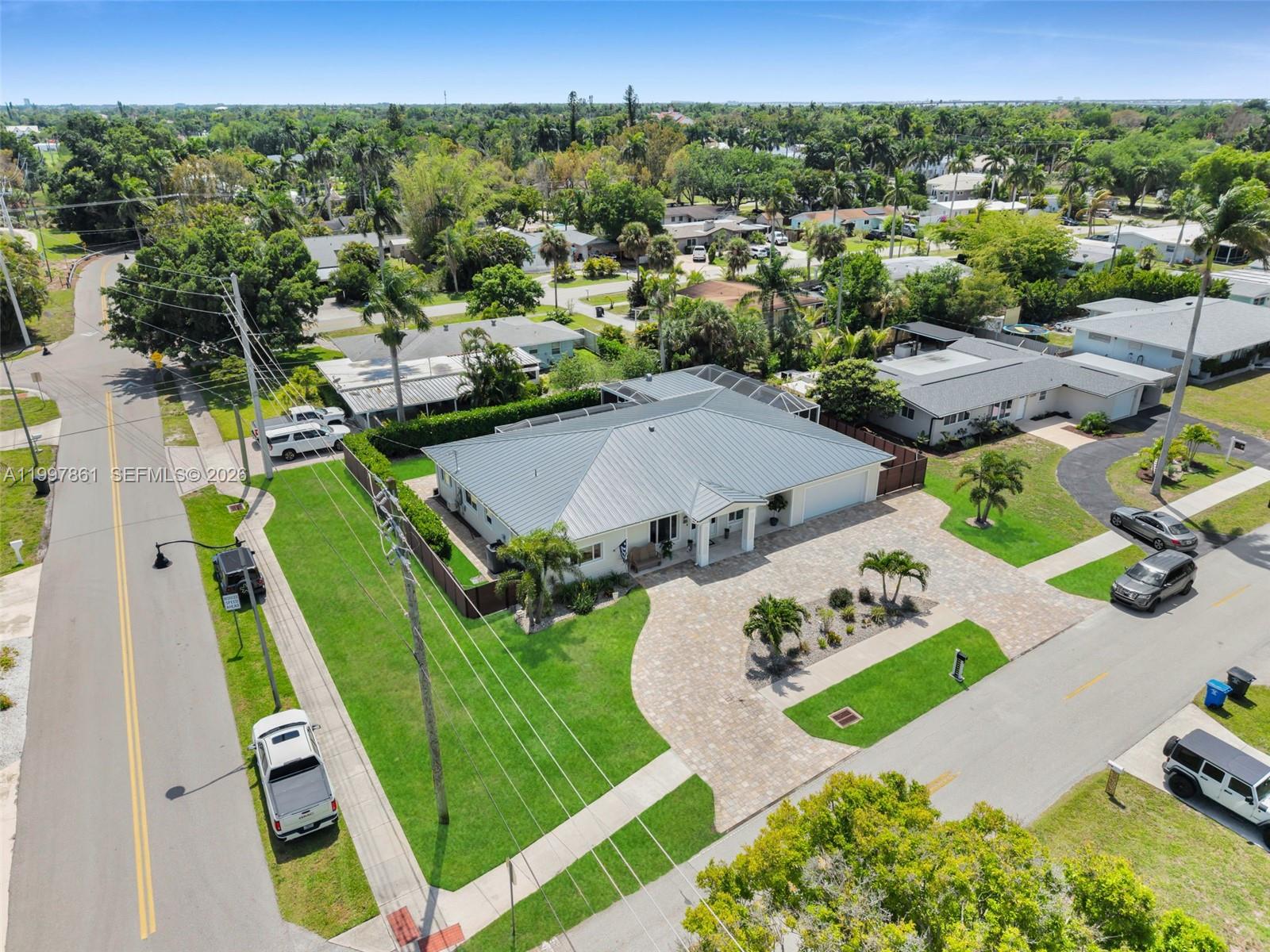 1574 Ricardo Avenue Fort Myers, FL 33901 - Photo 52 of 59 an aerial view of a house