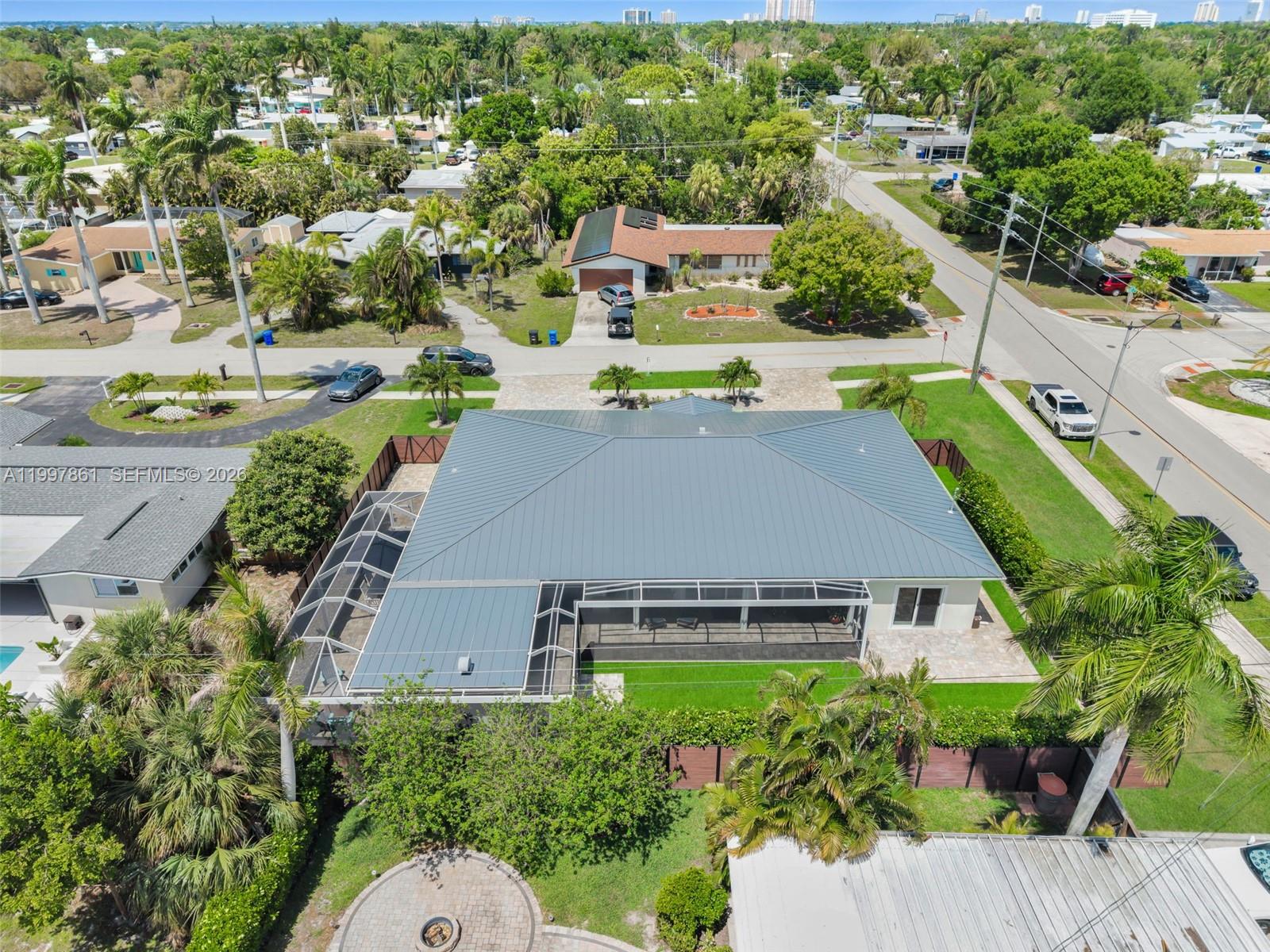 1574 Ricardo Avenue Fort Myers, FL 33901 - Photo 54 of 59 an aerial view of a house with a garden
