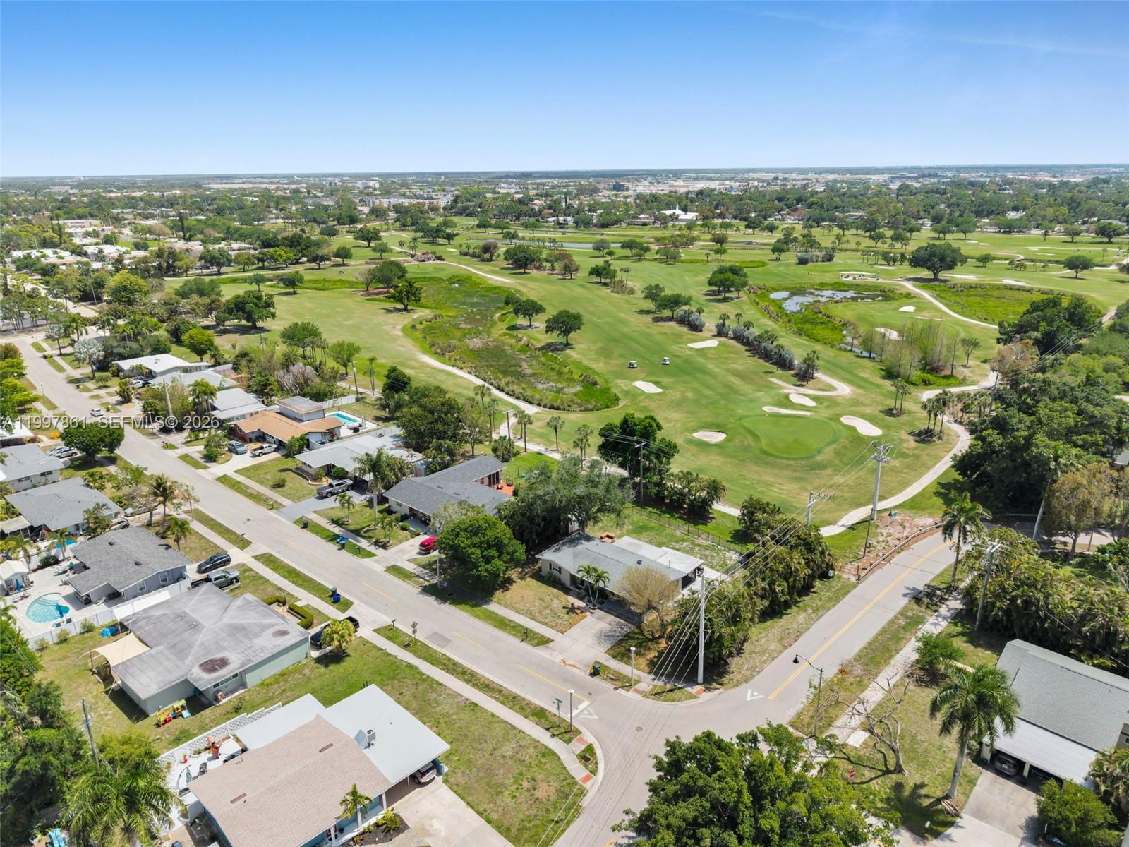 1574 Ricardo Avenue Fort Myers, FL 33901 - Photo 57 of 59 an aerial view of residential houses with outdoor space