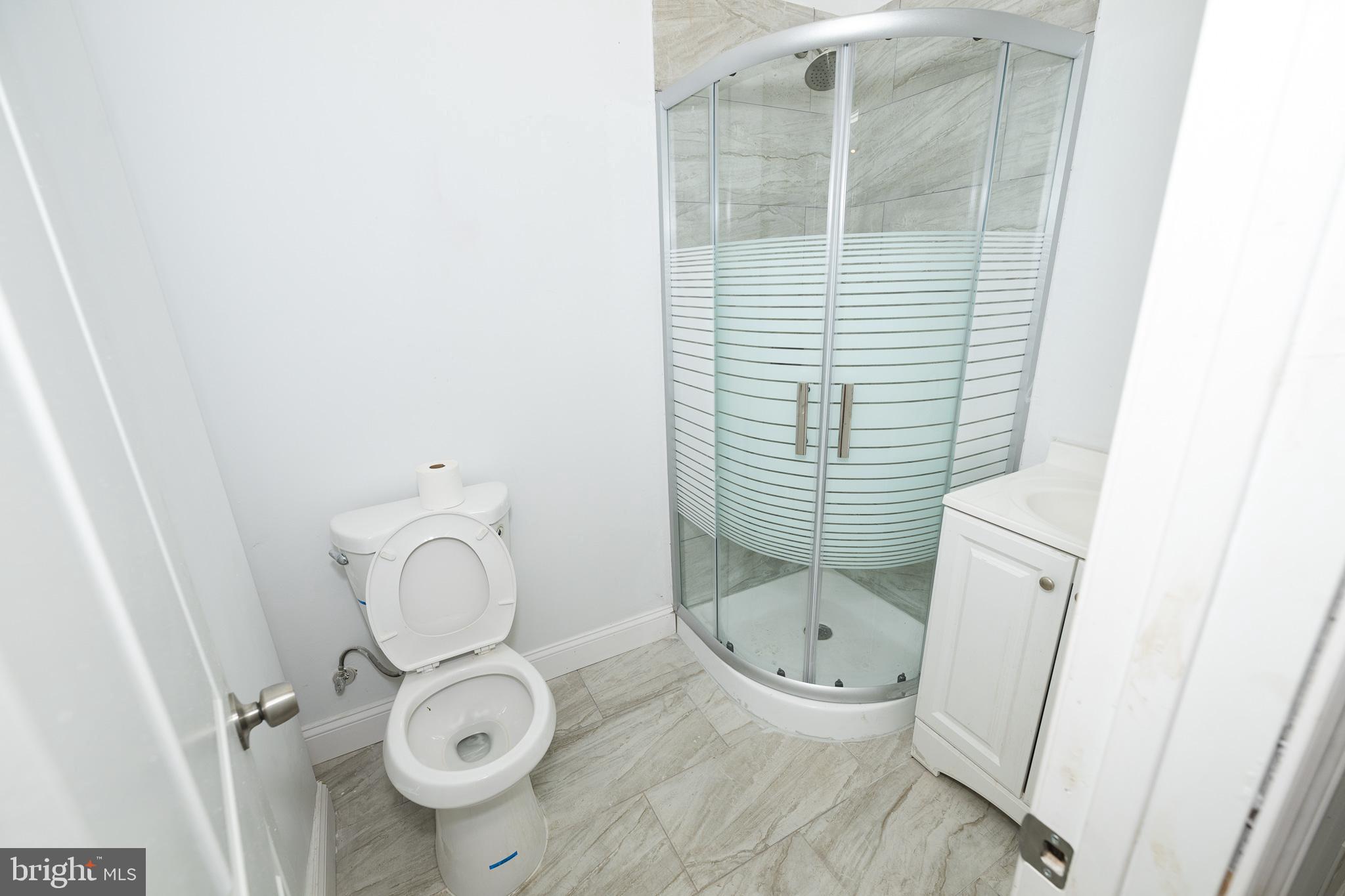427 North 33rd Street Philadelphia, PA 19104 - Photo 4 of 9 a bathroom with a toilet and a shower