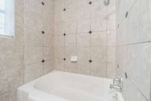 a bathroom with a bathtub