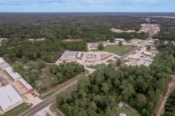 an aerial view of residential house with outdoor space