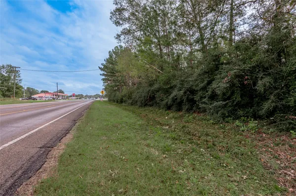 a view of a road with an outdoor space