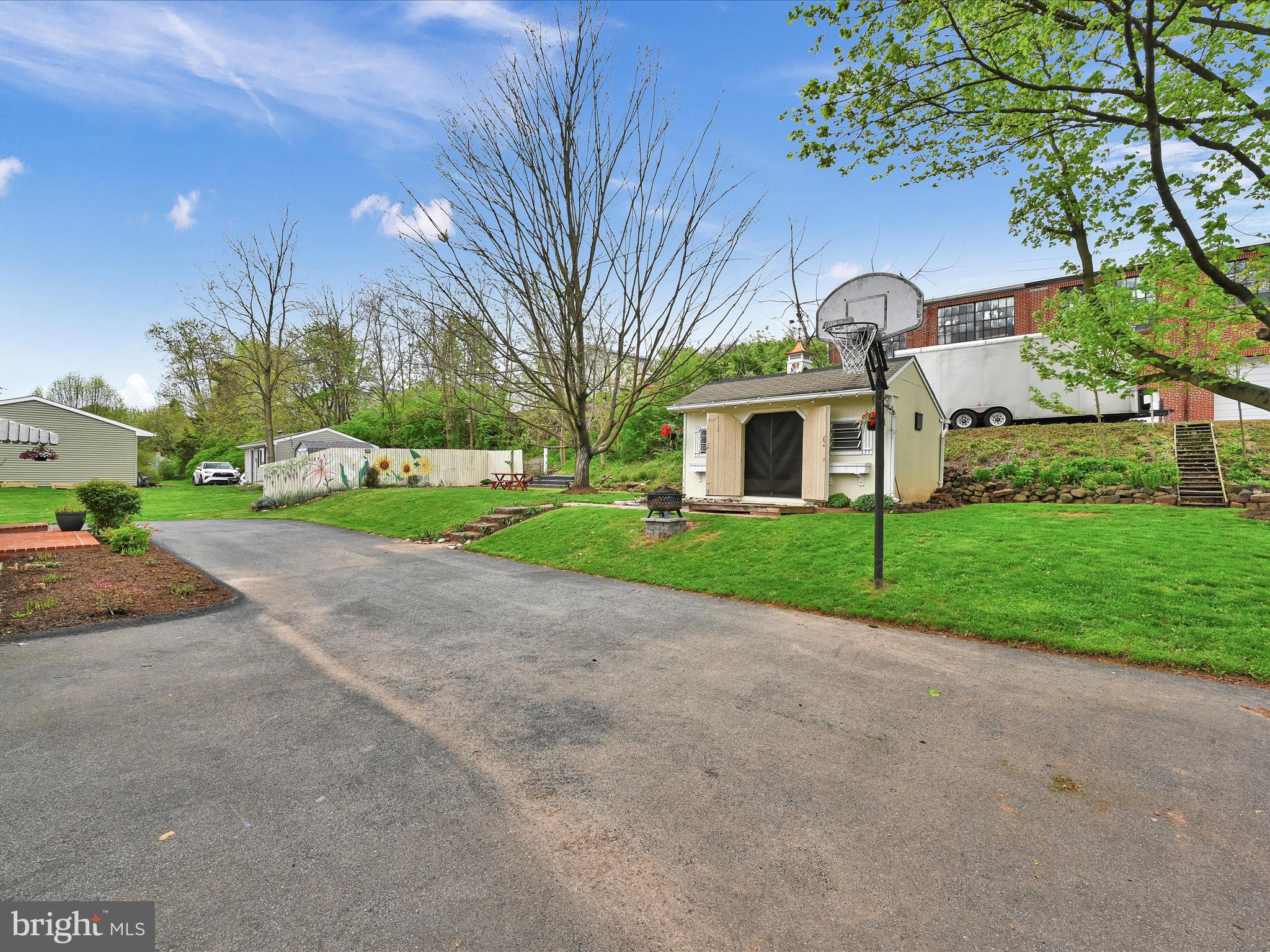 21 Landis Road Ephrata, PA 17522 - Photo 26 of 30 Backyard with Shed Basketball Net