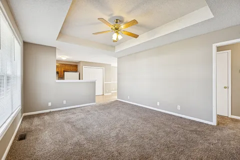 a kitchen with a refrigerator a stove top oven a sink and dishwasher