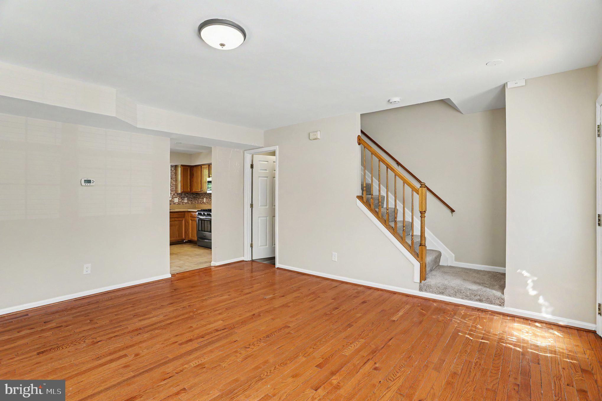 32 Tameron Place Rosedale, MD 21237 - Photo 6 of 39 Hardwood floors in living room