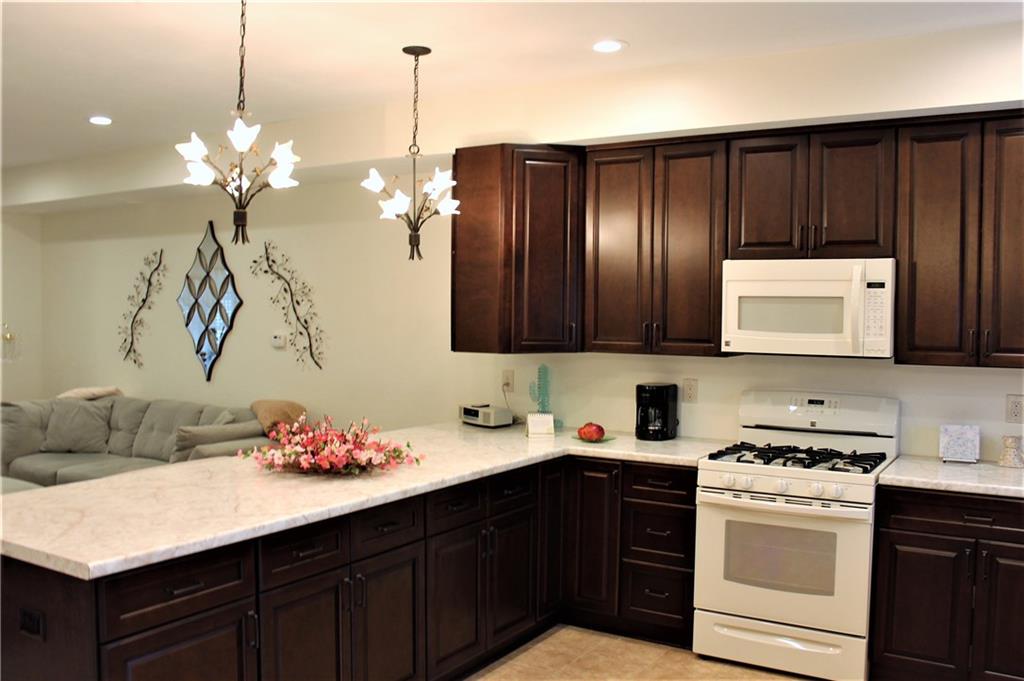 307 Wineberry Ridge Court Irwin, PA 15642 - Photo 5 of 18 Kitchen has a large peninsula suitable for barstools.