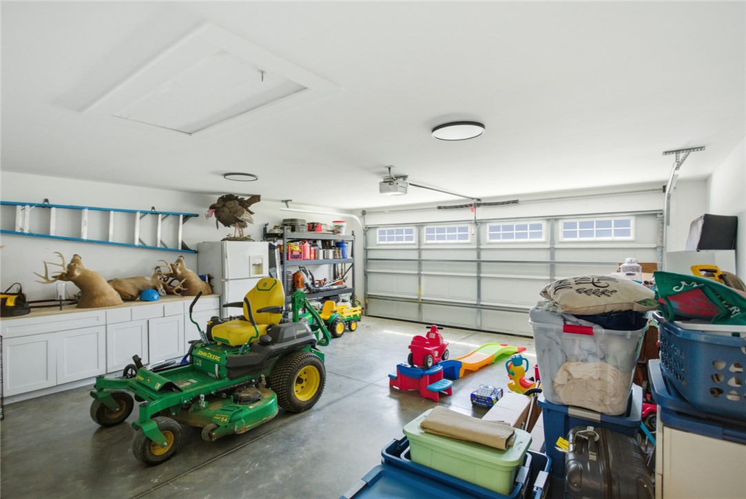 119 Brook Lane Seneca, SC 29672 - Photo 22 of 43 This spacious garage offers versatile utility, perfect for storage and various activities.