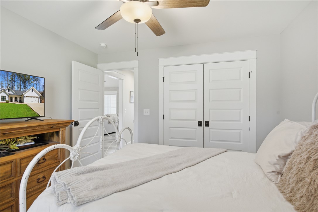 119 Brook Lane Seneca, SC 29672 - Photo 24 of 43 Comfortable bedroom retreat features ample closet space and bright, welcoming ambiance.