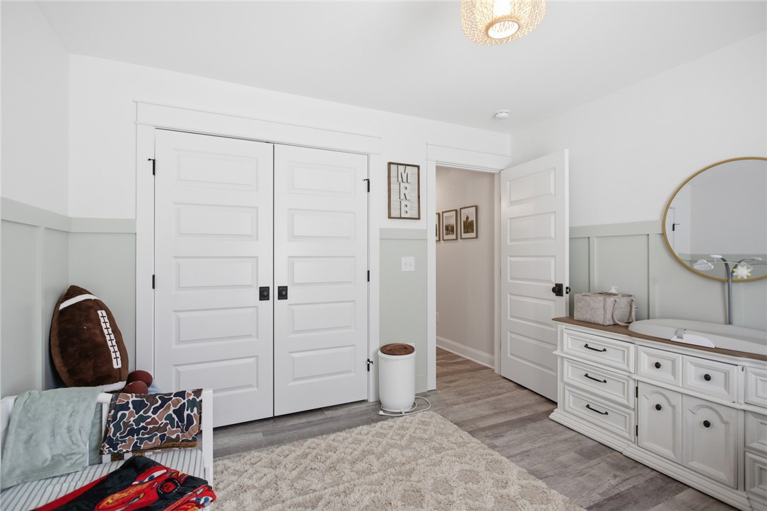 119 Brook Lane Seneca, SC 29672 - Photo 27 of 43 This cozy bedroom features durable flooring and ample closet space, creating a serene personal retreat.