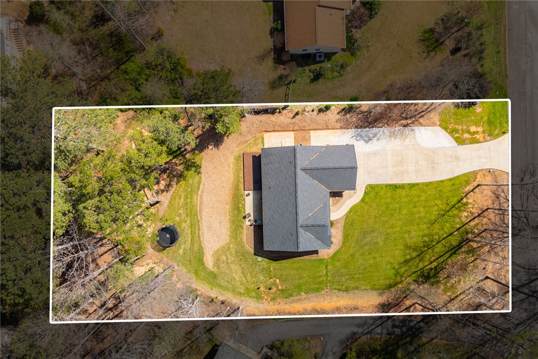 119 Brook Lane Seneca, SC 29672 - Photo 41 of 43 An aerial view showcases a well-maintained property with a verdant lawn and mature trees.