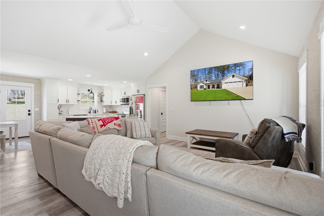 119 Brook Lane Seneca, SC 29672 - Photo 5 of 43 Bright and airy open concept living area seamlessly connects to the kitchen, perfect for everyday living.