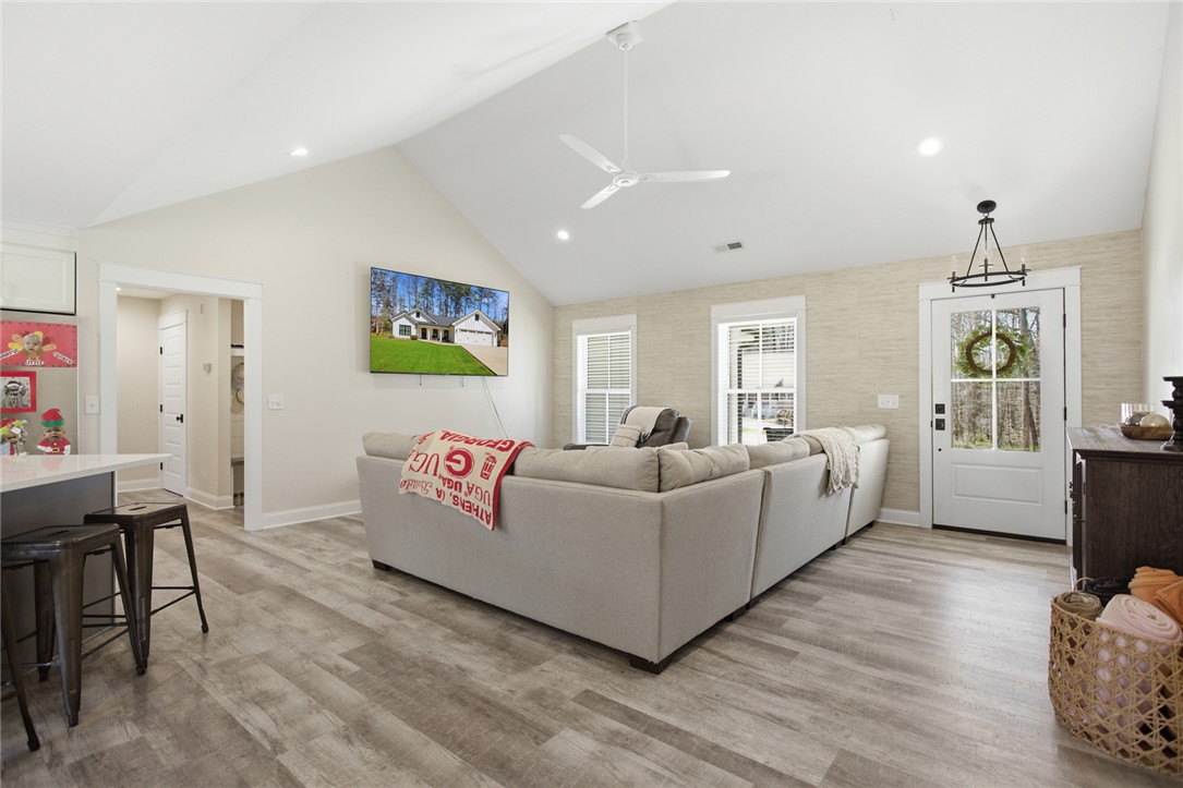 119 Brook Lane Seneca, SC 29672 - Photo 6 of 43 This airy living space features abundant natural light and seamless indoor-outdoor connection.