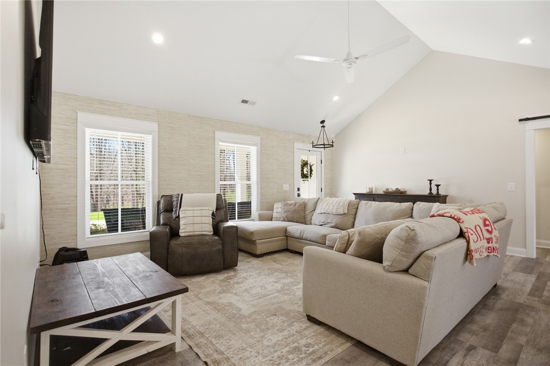 119 Brook Lane Seneca, SC 29672 - Photo 7 of 43 This airy living space features vaulted ceilings and ample natural light, perfect for gatherings.