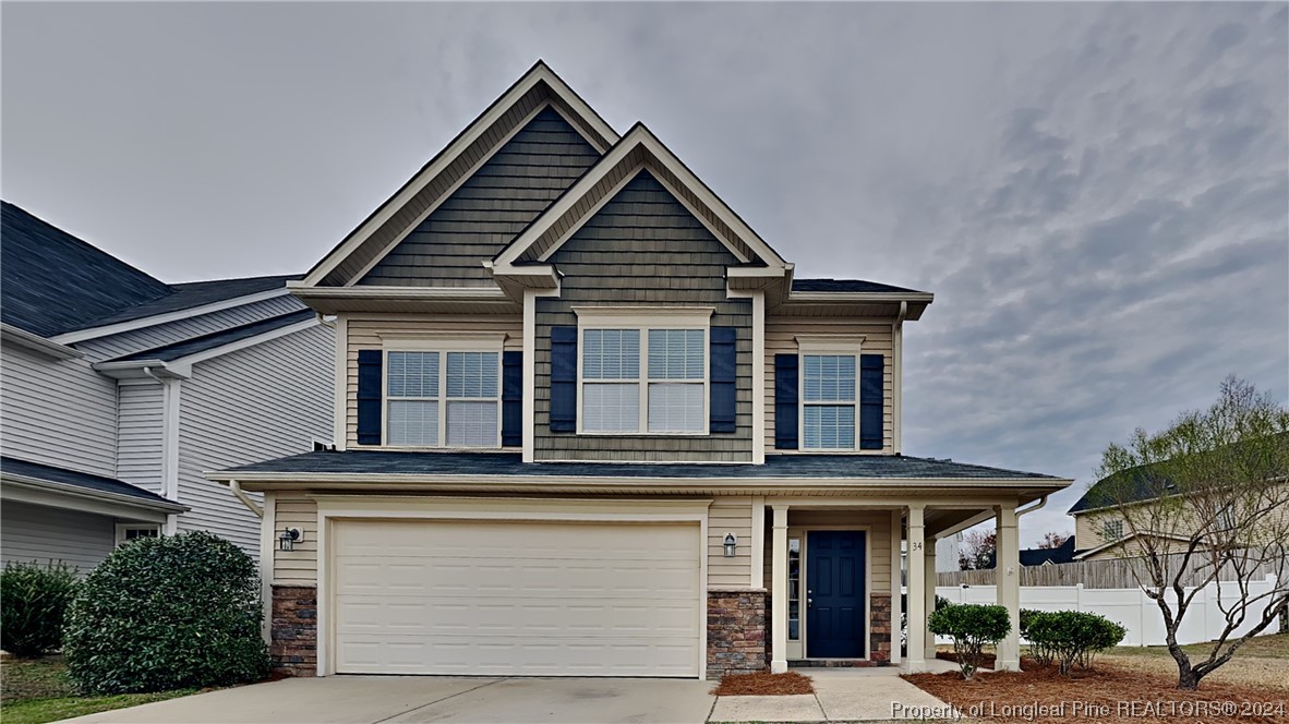 34 Huzzas Circle Cameron, NC 28326 - Photo 1 of 15 a house view with a outdoor space