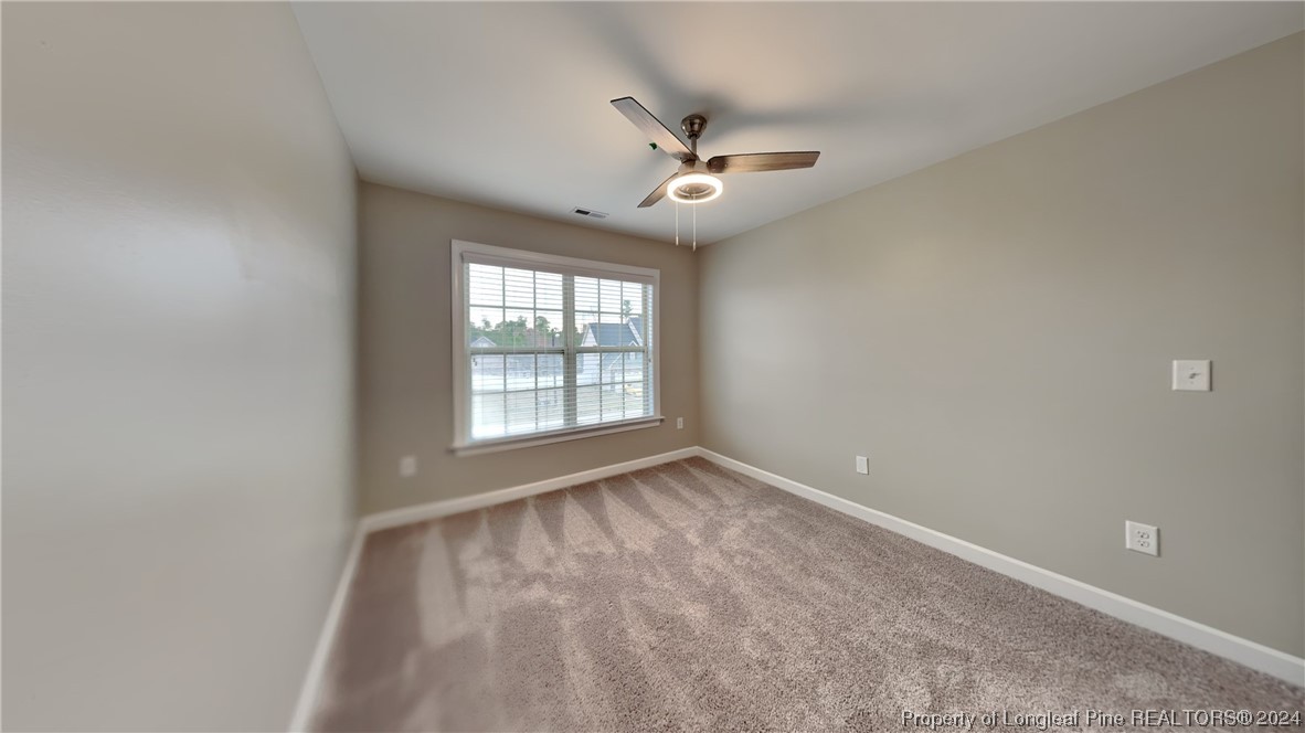 34 Huzzas Circle Cameron, NC 28326 - Photo 9 of 15 a view of an empty room with a window