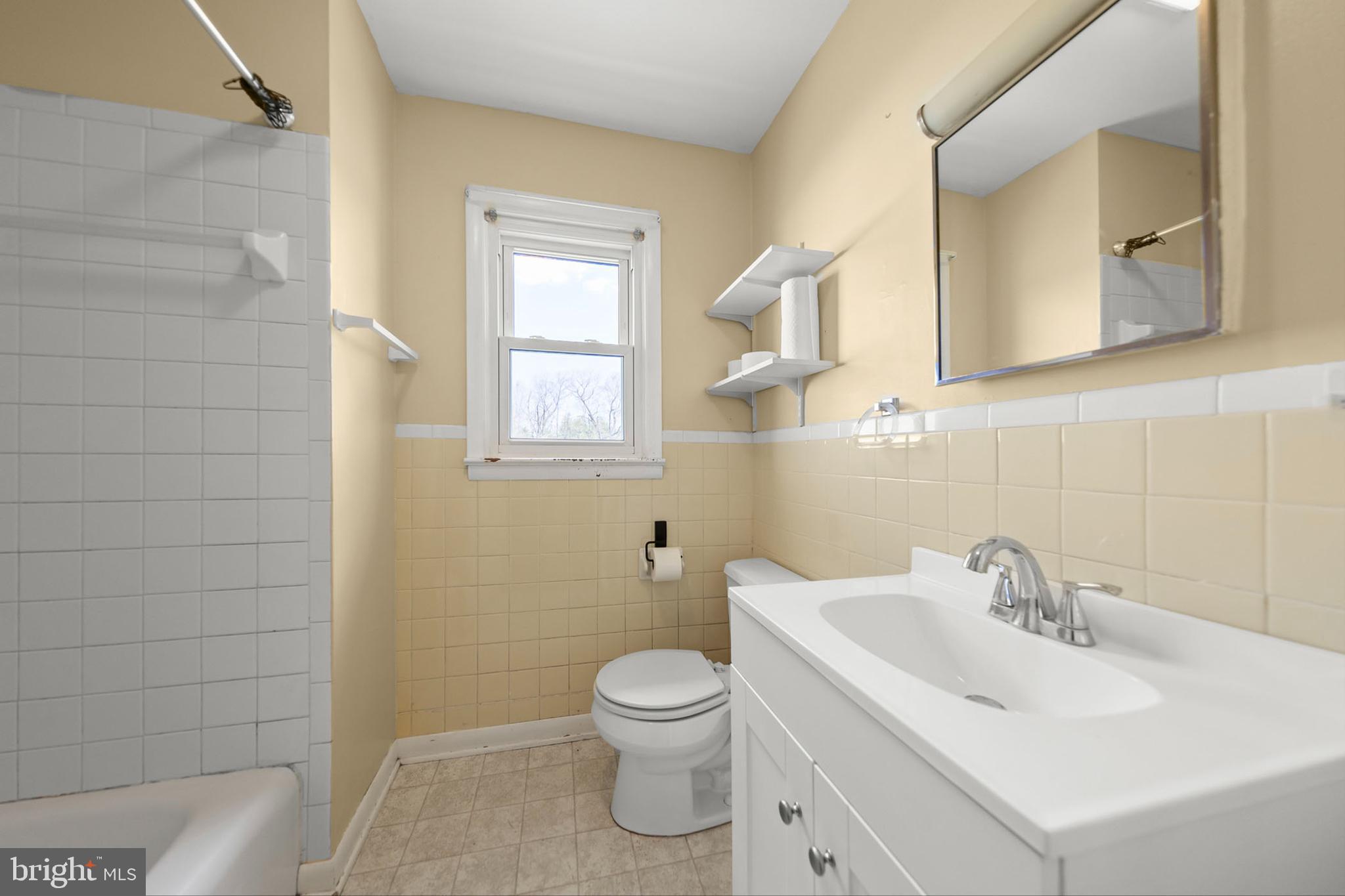 1156 Salem Church Road Stephens City, VA 22655 - Photo 17 of 37 a bathroom with a toilet sink and mirror