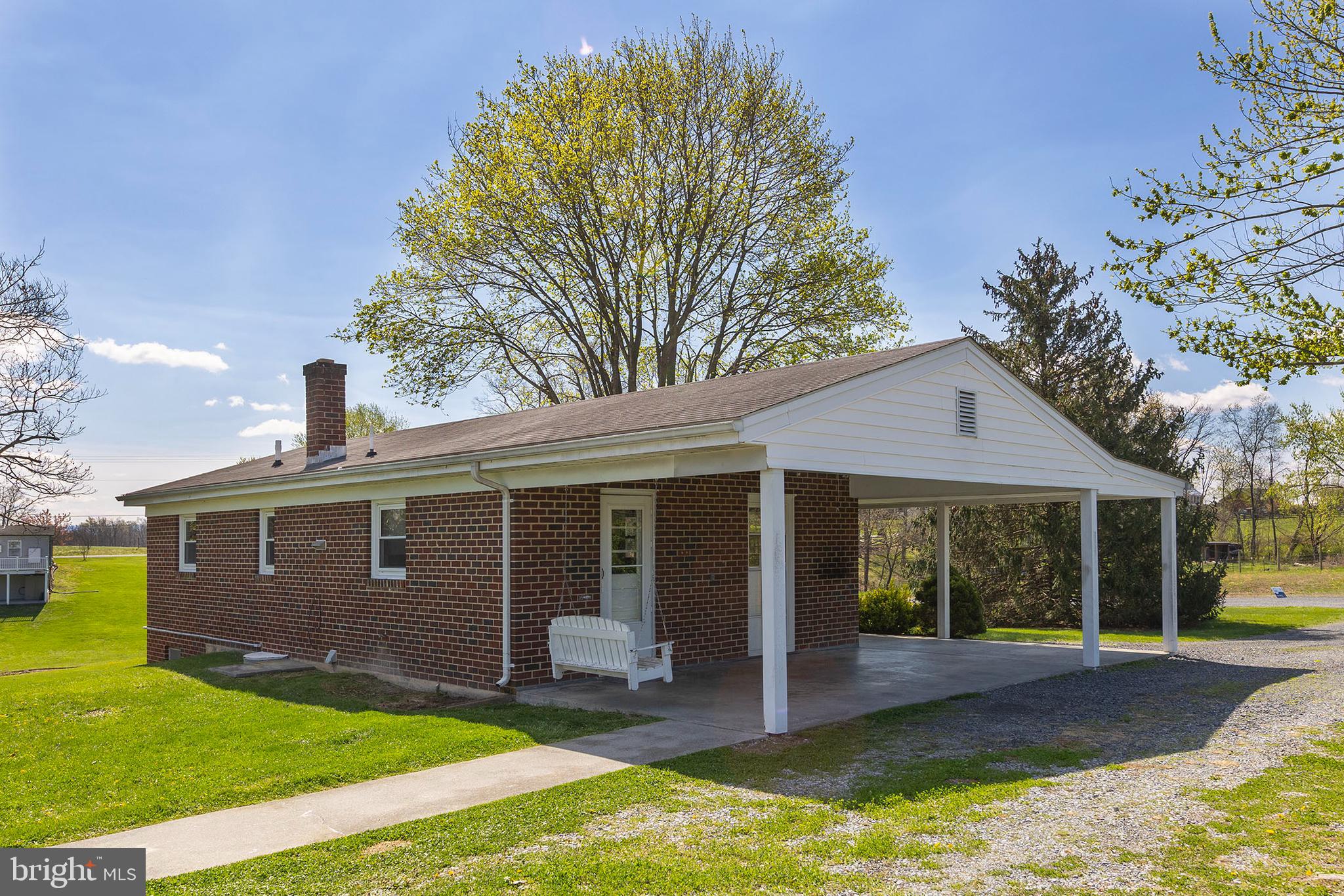 1156 Salem Church Road Stephens City, VA 22655 - Photo 29 of 37 a view of a house with a yard and large tree