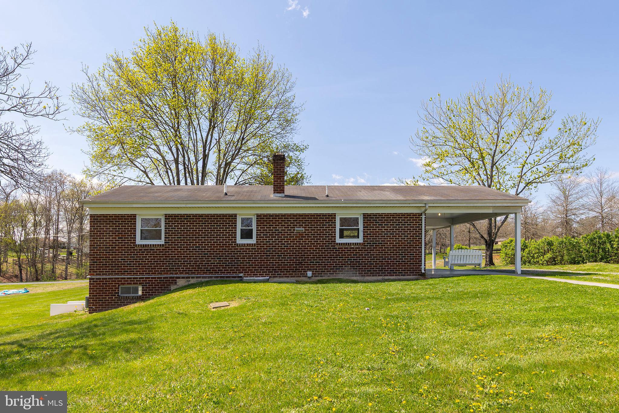 1156 Salem Church Road Stephens City, VA 22655 - Photo 30 of 37 a front view of house with yard and trees in the background