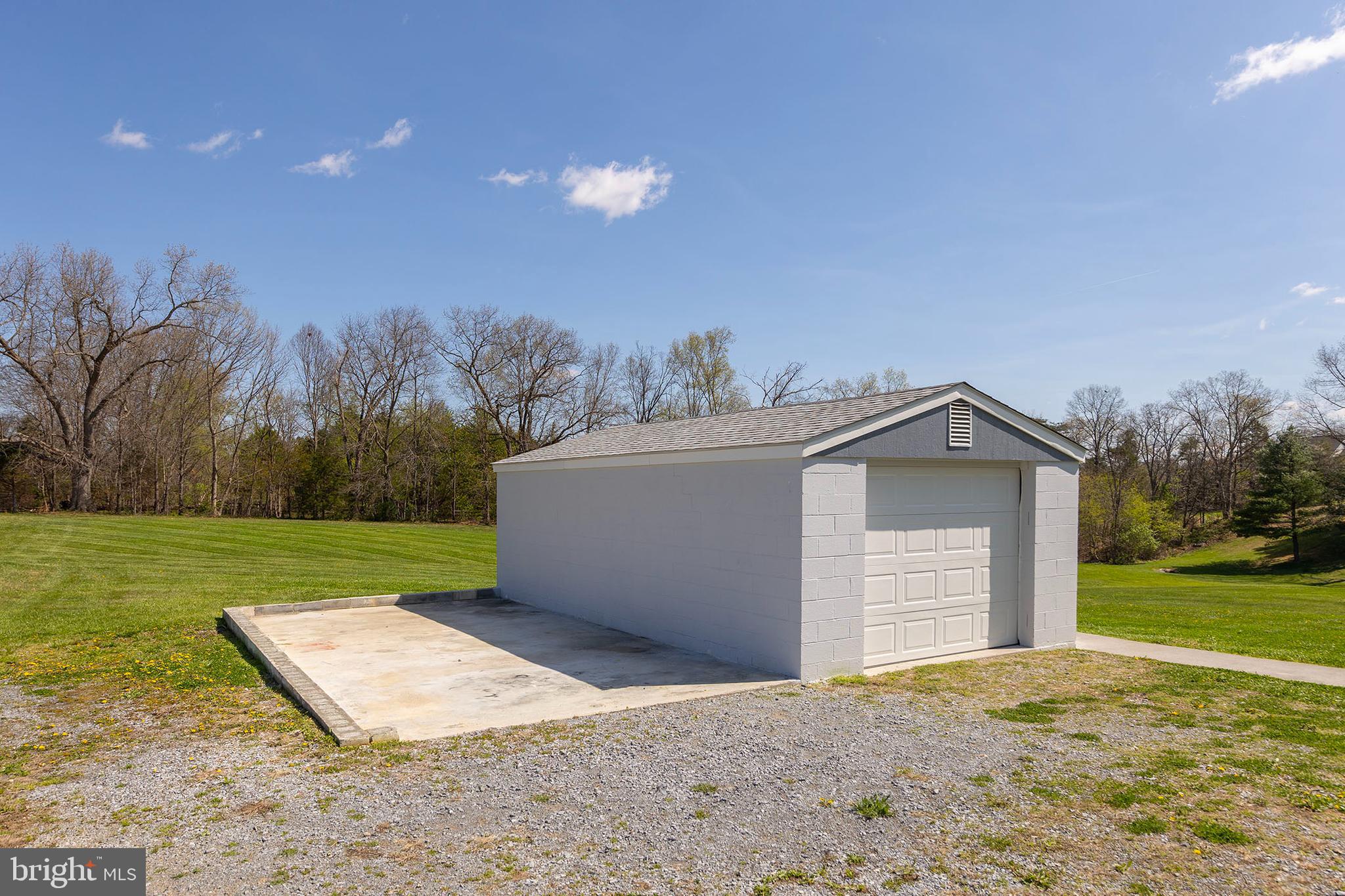 1156 Salem Church Road Stephens City, VA 22655 - Photo 37 of 37 a view of a house with a yard and a garage