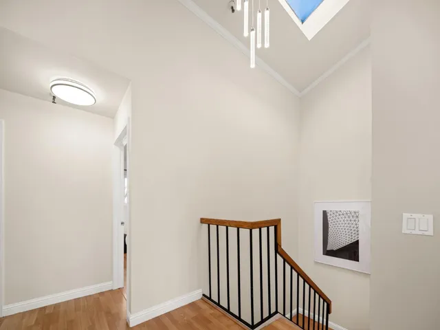 a view of a hallway with entryway