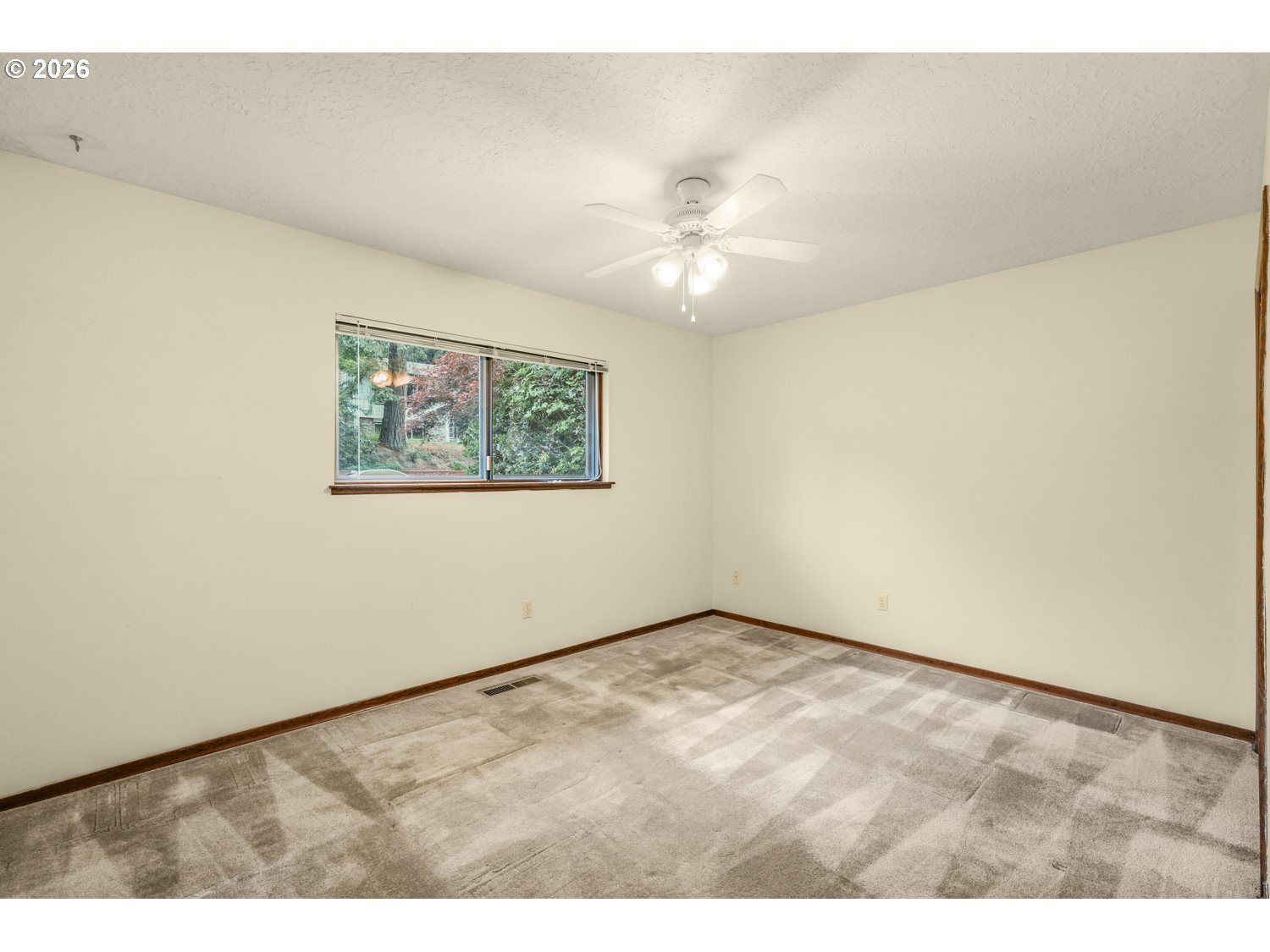 14155 Southwest 27th Street Beaverton, OR 97008 - Photo 22 of 27 a view of an empty room