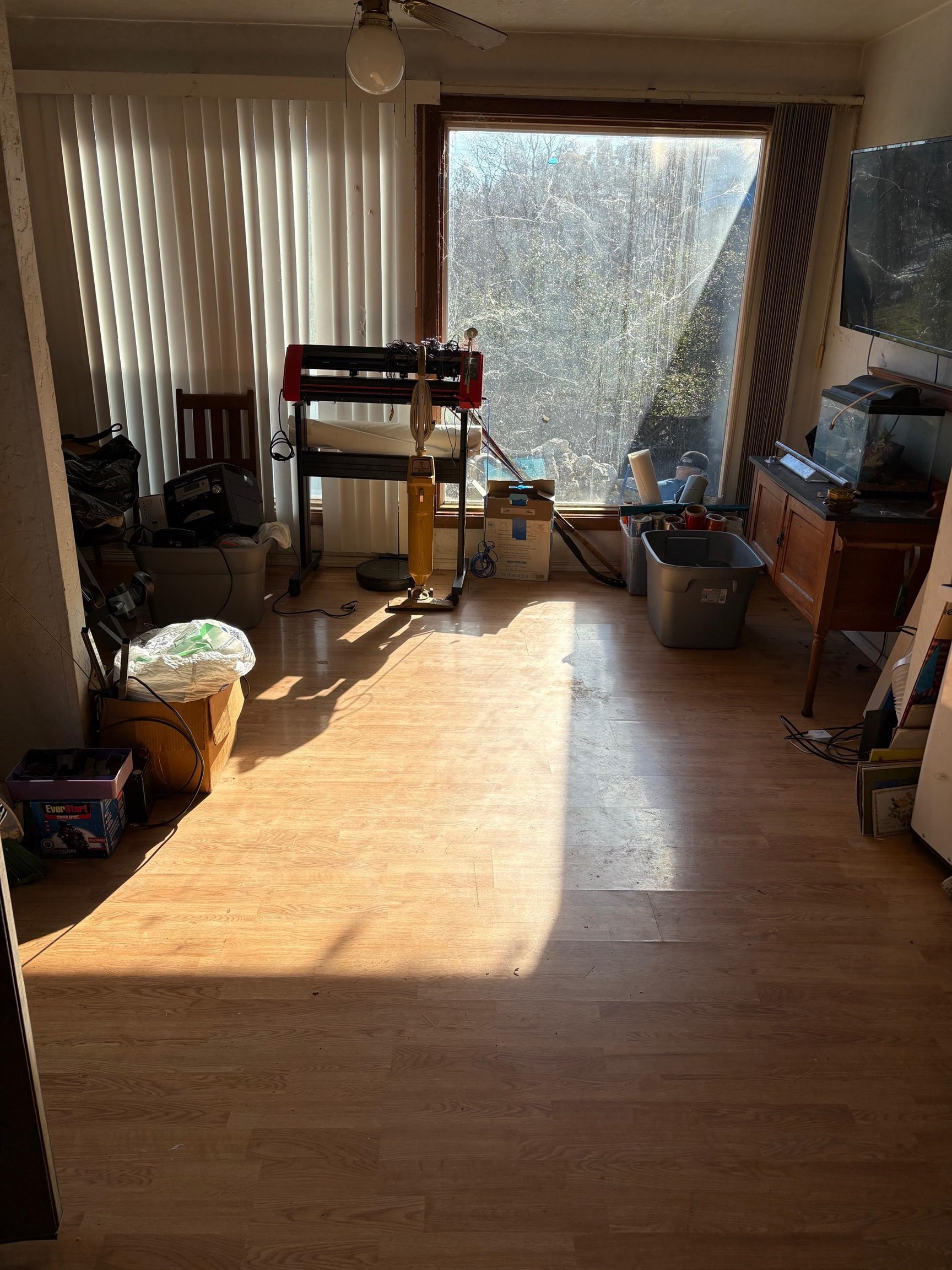 830 Shaws Flat Road Sonora, CA 95370 - Photo 6 of 11 Living area with healthy amount of natural light and wood finished floors