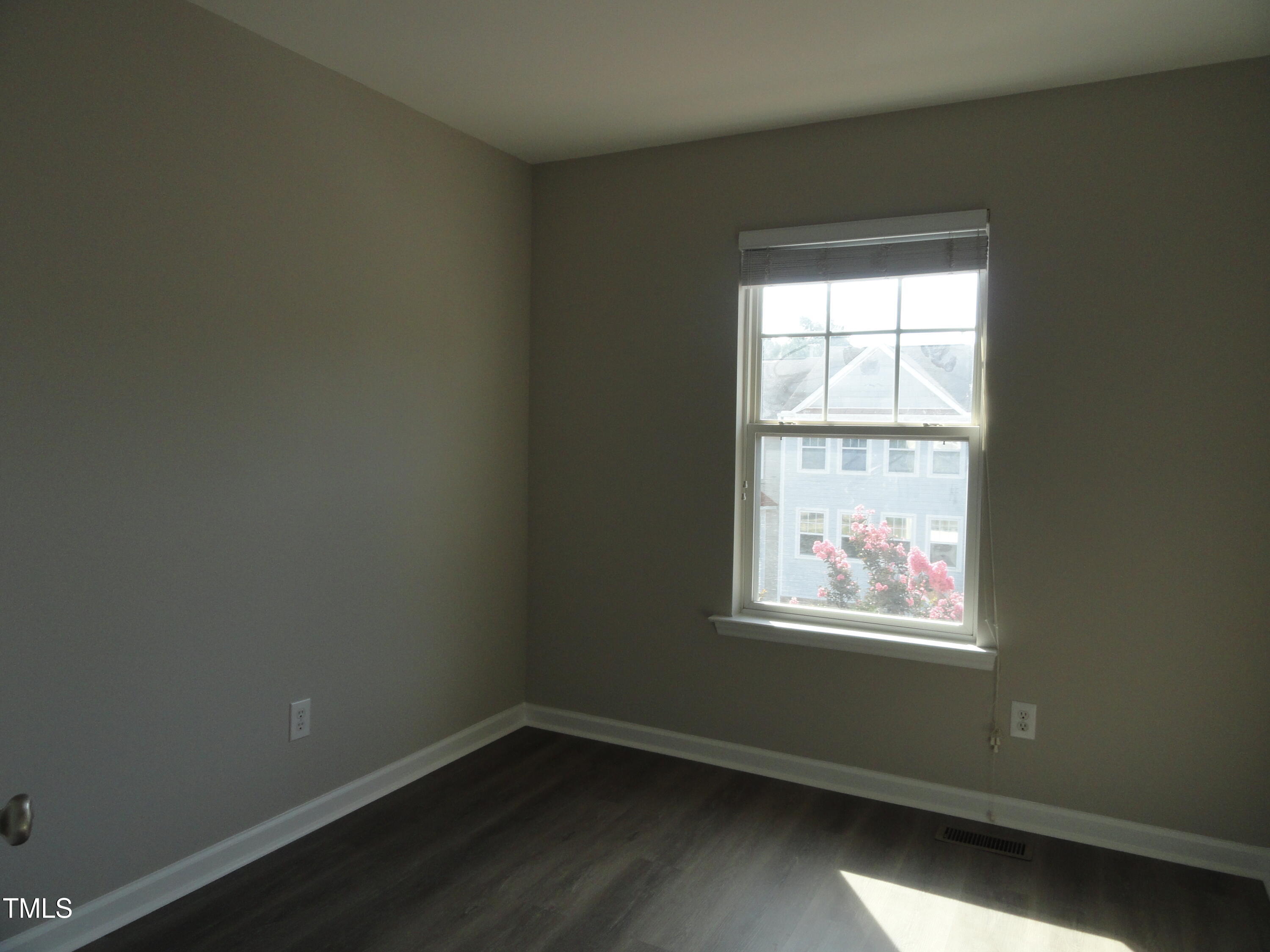 1531 Haywards Heath Lane Apex, NC 27502 - Photo 22 of 25 an empty room with a window