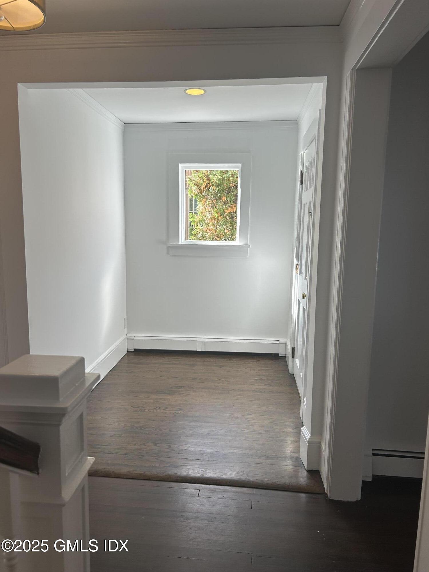 112 East Elm Street, Unit 1 Greenwich, CT 06830 - Photo 16 of 19 a view of an empty room with a window