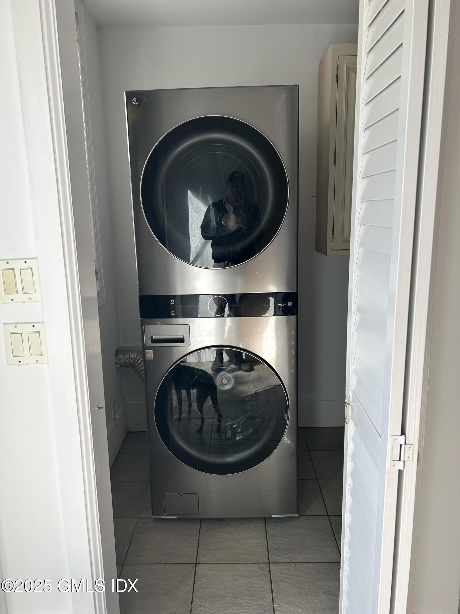 112 East Elm Street, Unit 1 Greenwich, CT 06830 - Photo 17 of 19 a utility room with dryer and washer