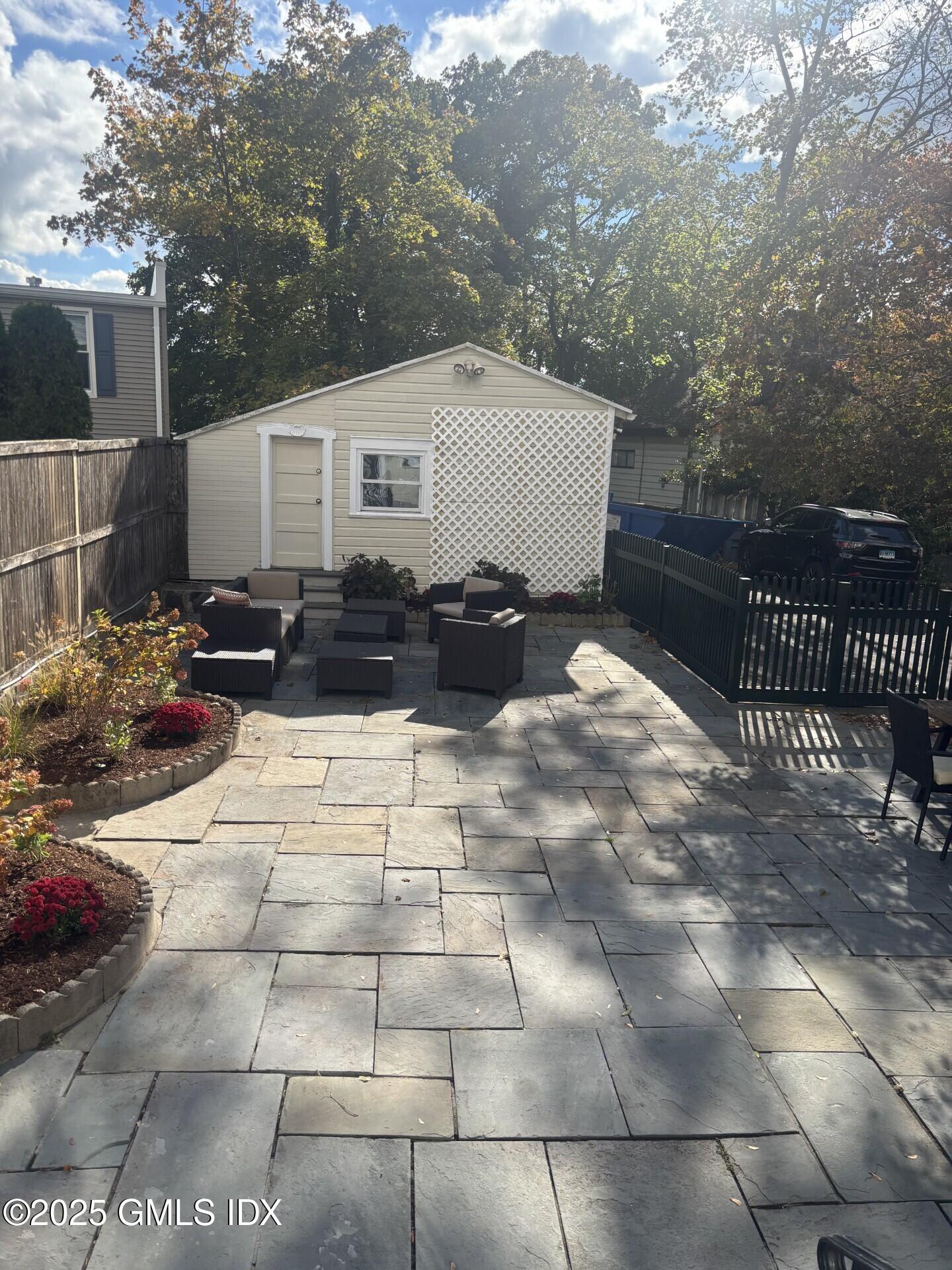 112 East Elm Street, Unit 1 Greenwich, CT 06830 - Photo 18 of 19 a view of a couches with fire pit