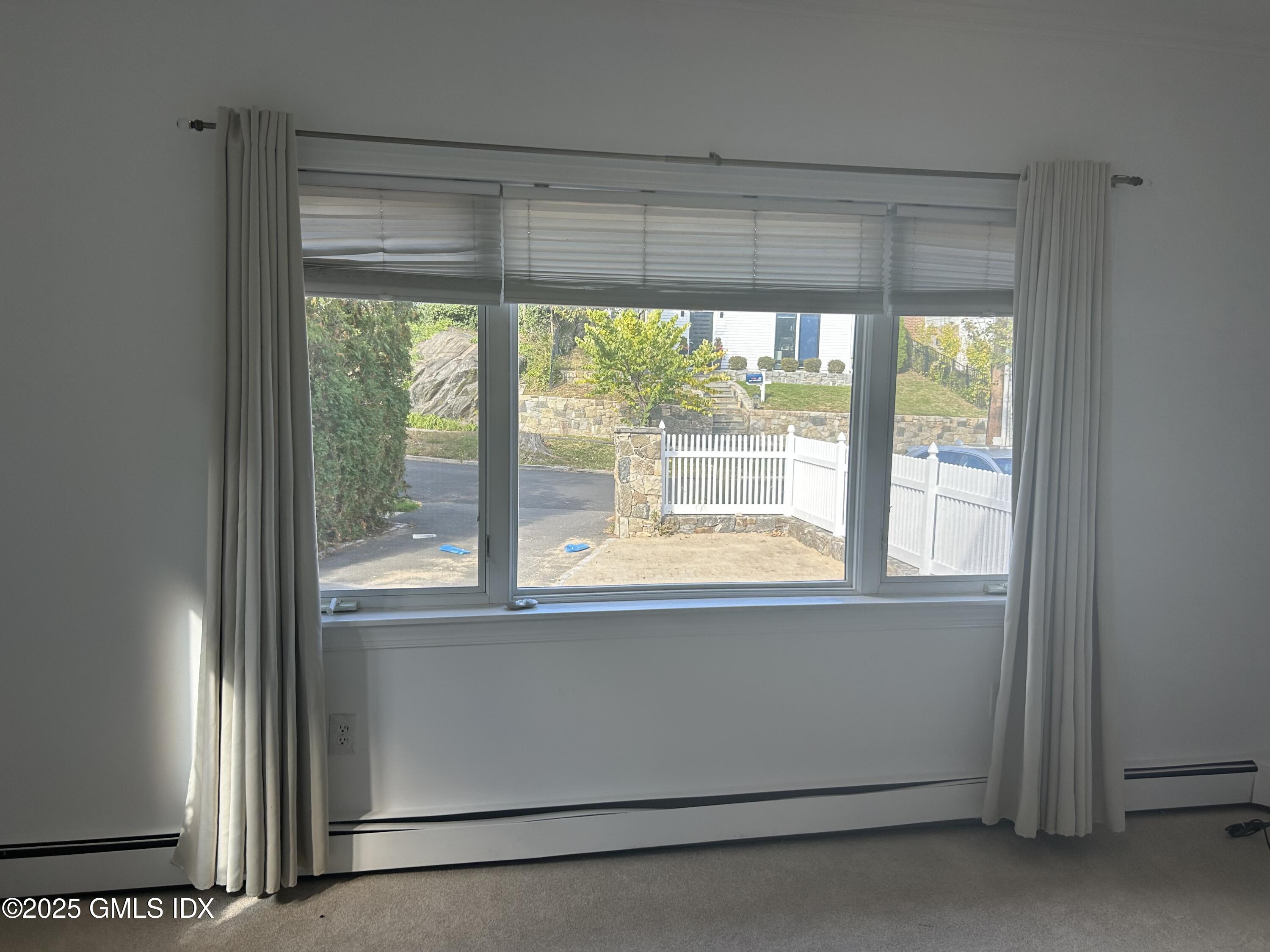 112 East Elm Street, Unit 1 Greenwich, CT 06830 - Photo 7 of 19 a view of a room that has a large window