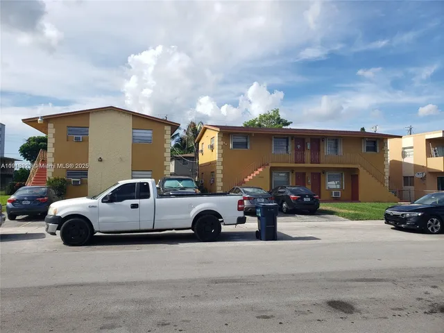 a car parked in front of a house
