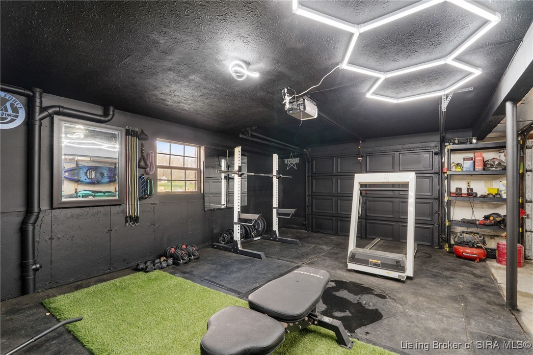 5510 Briarhill Drive Floyds Knobs, IN 47119 - Photo 86 of 88 Home gym in garage. New paint and lighting