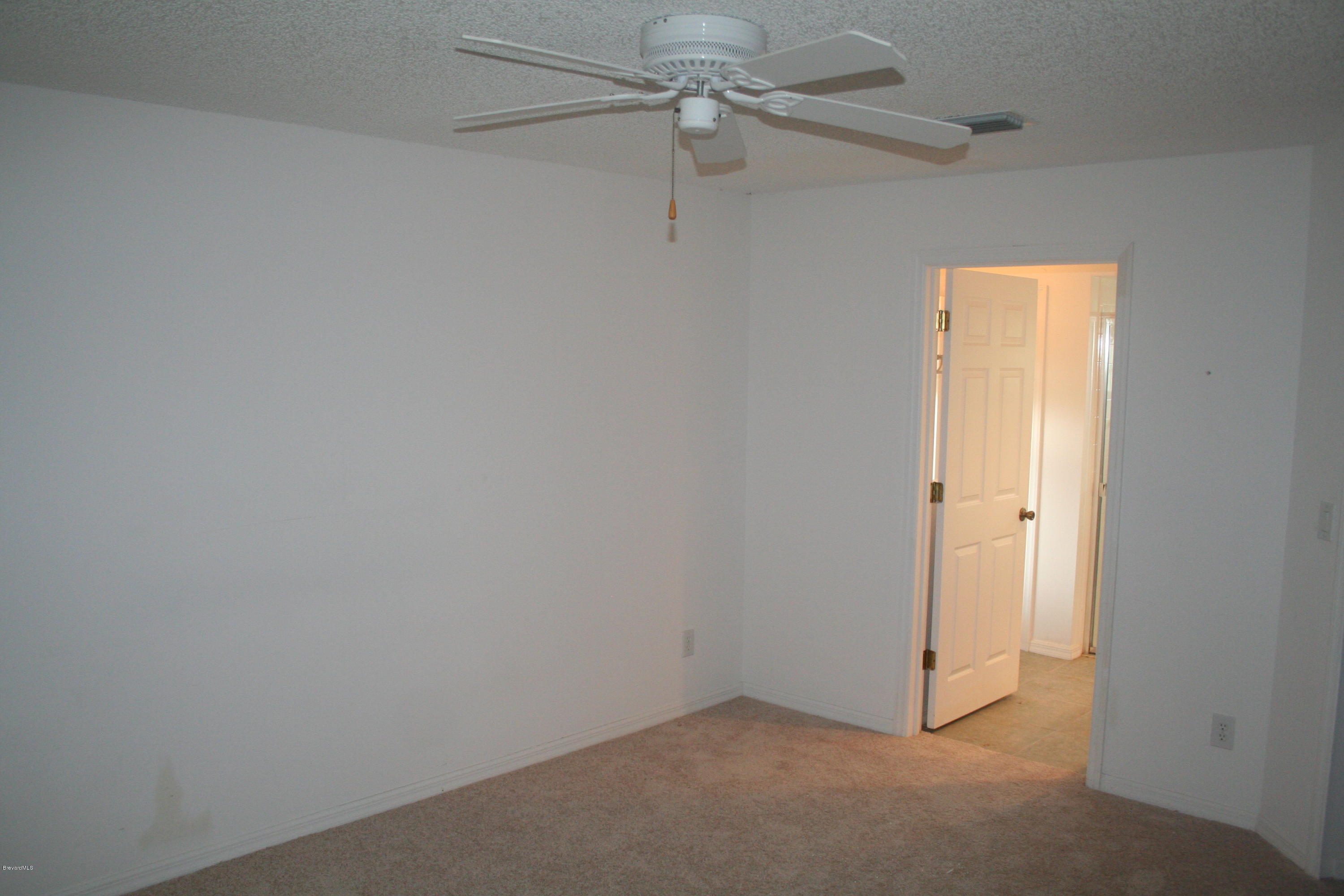 1350 Weiman Road Southeast Palm Bay, FL 32909 - Photo 5 of 12 Master Bedroom
