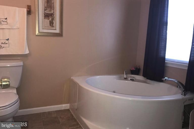 3924 Glenhurst Road Baltimore, MD 21222 - Photo 14 of 20 Upper level Master Suite with soaking tub