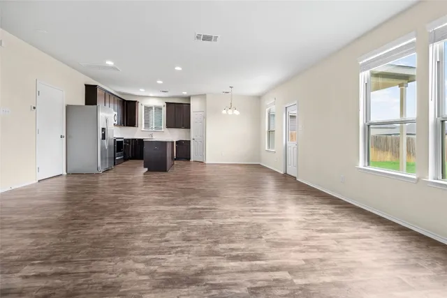 a view of kitchen with furniture and window