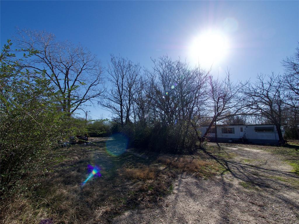 6700 Smoke Lane Scurry, TX 75158 - Photo 7 of 10 a backyard of a house with lots of green space