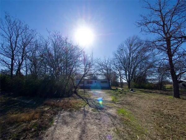 $100,000 | 6700 Smoke Lane, Scurry, TX 75158