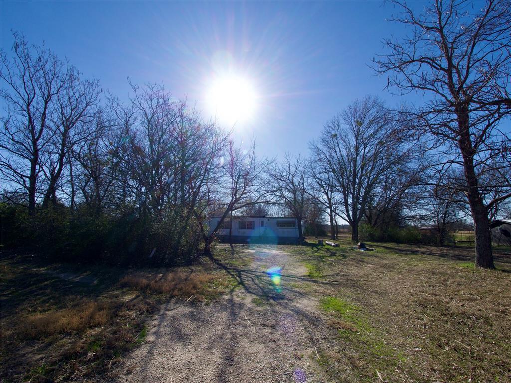 6700 Smoke Lane Scurry, TX 75158 - Photo 9 of 10 a view of a yard with a house