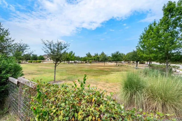 a view of a lake with a big yard