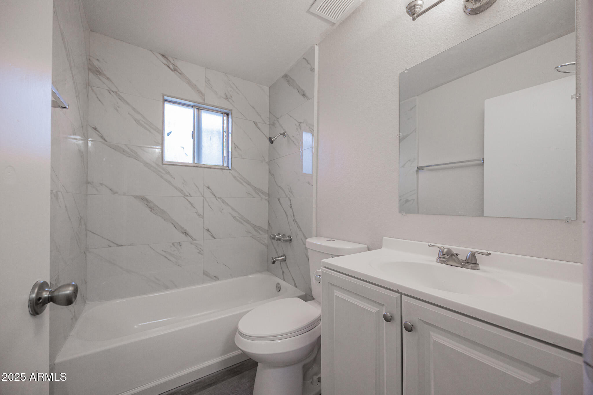 2340 East Broadway Road, Unit A Mesa, AZ 85204 - Photo 10 of 14 a bathroom with a sink toilet and shower