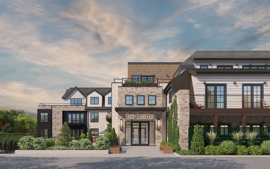 148 Weston Road, Unit 108 Wellesley, MA 02482 - Photo 2 of 11 front view of a house with a street