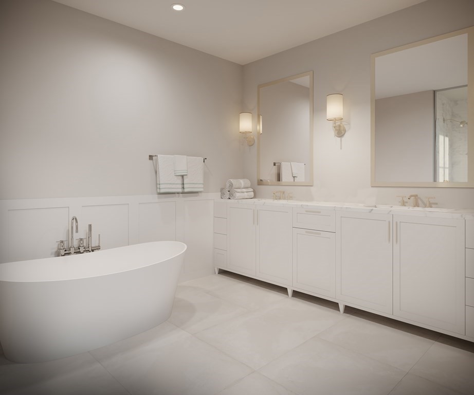 148 Weston Road, Unit 108 Wellesley, MA 02482 - Photo 8 of 11 a bathroom with a sink a mirror and a bathtub